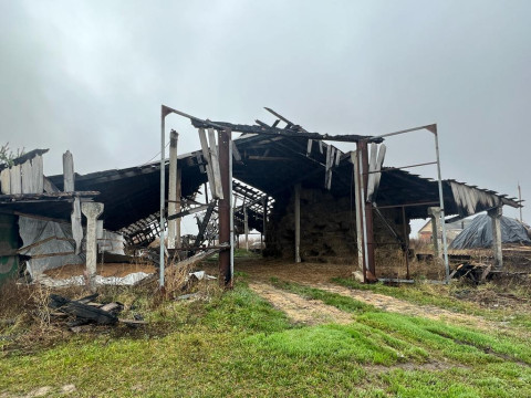 Destroyed production buildings of the "Svitanok" family farm. The village Pochepin, Bucha district, Kyiv region. 16 November 2022. 