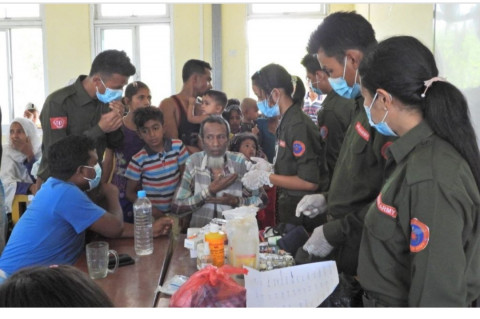 In response to COVID-19 third-wave, a group of medical officers from the Arakan Army did healthcare at Arkataung village’s school in Rathedaung township on 19 May 2021