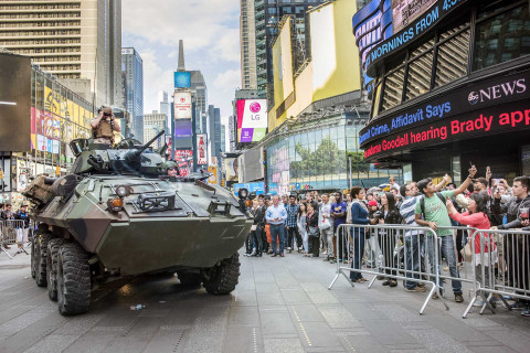 USA, New York, 2015, US Marines in Times Square for Fleet Week  – demonstration weapons including rifles and arriving in an armored personnel carrier. 
