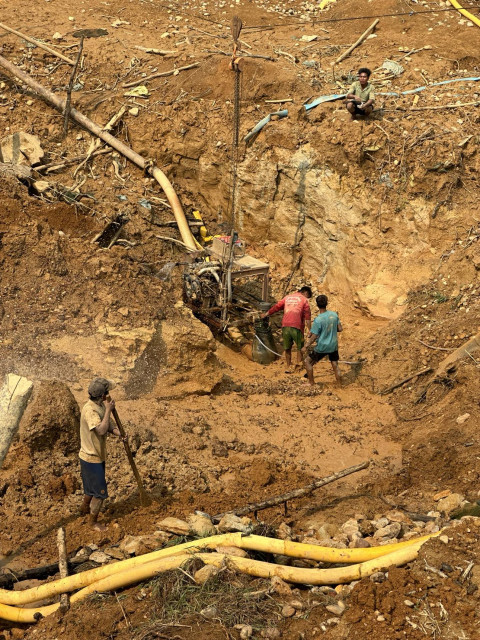 Gold mining along the river bank in Kachin State, Myanmar.