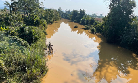 Mogaung River carrying mud and debris from upstream mining sites.