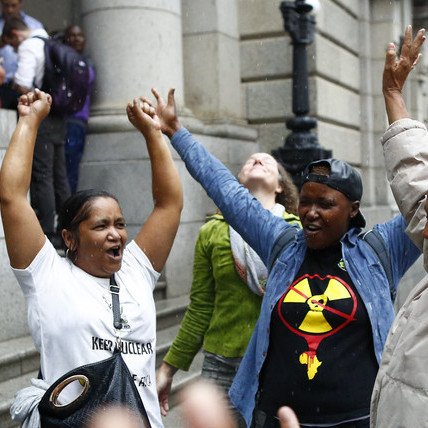 Celebrations outside the Western Cape High Court after it ruled against the South African government’s proposed nuclear deal.