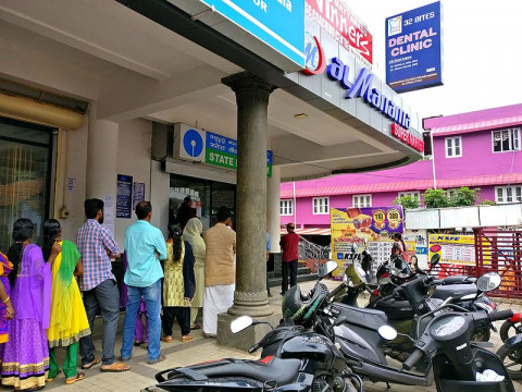People standing in queue in front of SBI Bank ATM at Paravur near Kollam city in Kerala to withdraw cash following Govt's currency demonetization decision in November 2016.