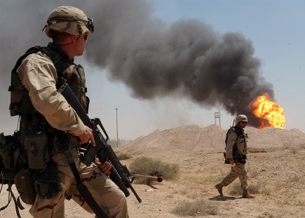 US troops watch burning oil fields in wake of US invasion in 2003 US troops watch burning oil fields in wake of US invasion in 2003