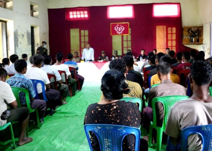 ULA officials speaking at an anti-narcotics meeting