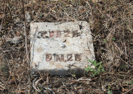 A stone in the middle of IDPs' former village to mark the railway track