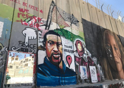 Taqi Spateen’s first mural of George Floyd on the Israeli Separation wall in Bethlehem, occupied West Bank. Photo by Yumna Patel.