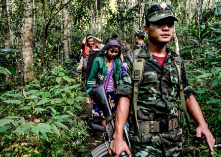 KNU soldiers accompany villagers in the forest during a time of increased Tatmadaw attacks in northern Karen State