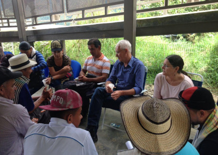 Martin and Coletta in a meeting with community leaders