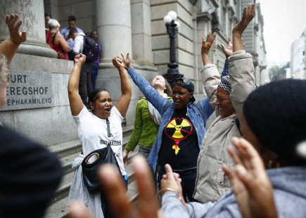 Celebrations outside the Western Cape High Court after it ruled against the South African government’s proposed nuclear deal.